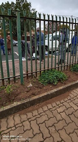 Correctional services assisting CPF Nigel Sector2 in painting fence at SAPS nigel